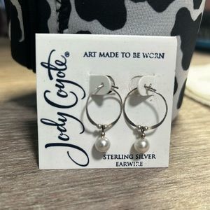 Sterling steel earrings with pearls.